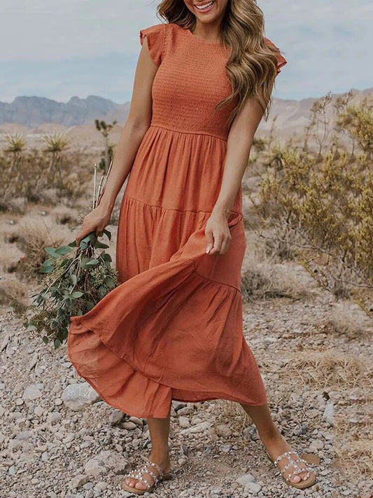 Elegante vestido de verano con detalles de volantes y bolsillos