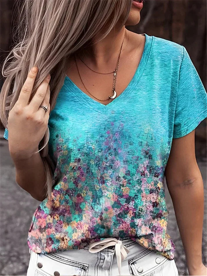 Camiseta con cuello de pico estampada con arte floral