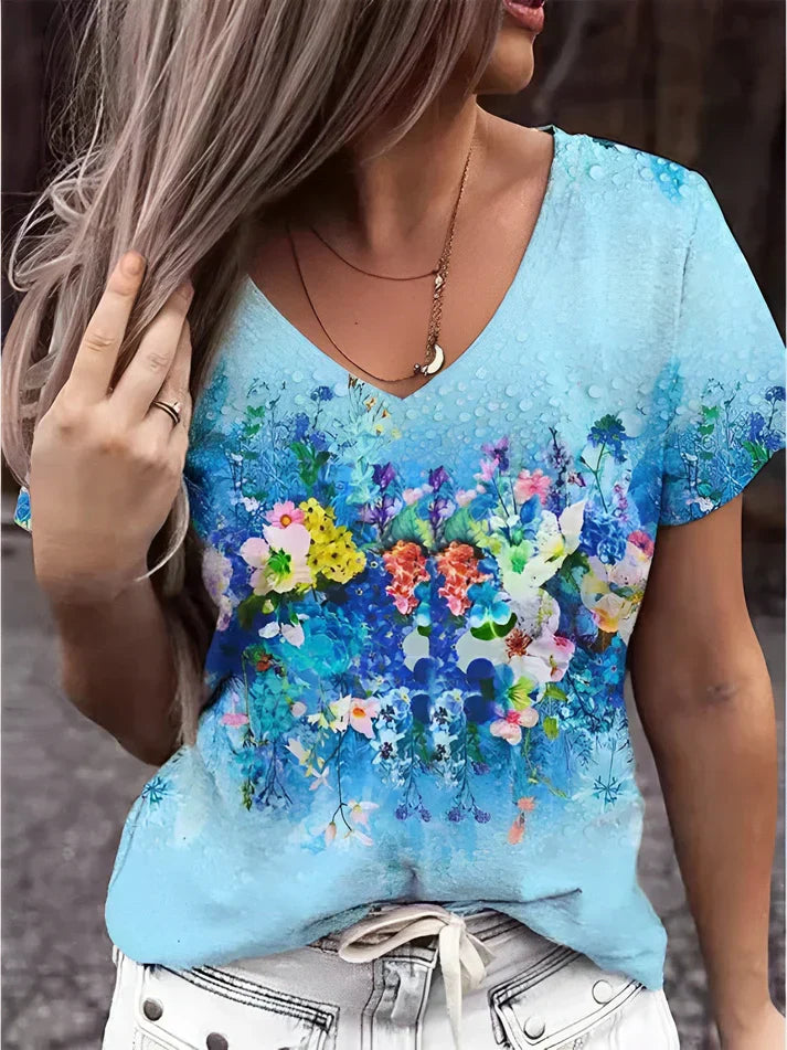 Camiseta con cuello de pico estampada con arte floral