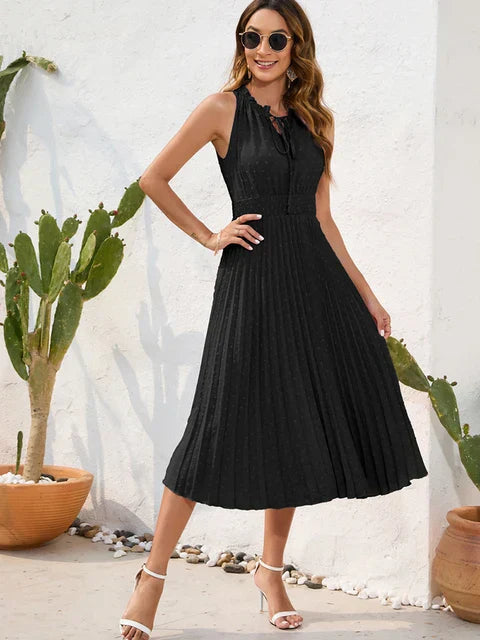 Carla - vestido negro plisado con escote halterneck