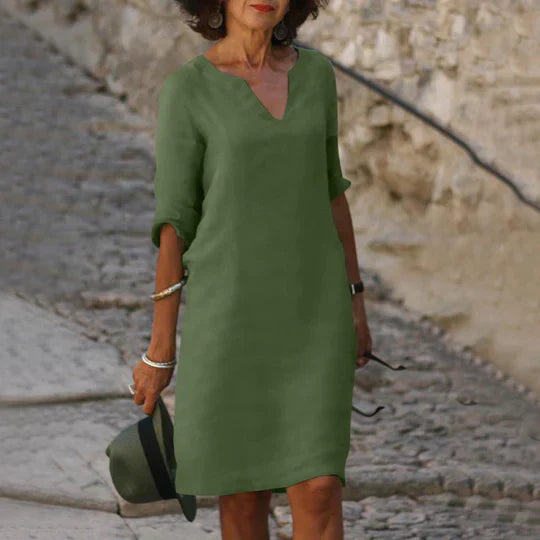 Sofia - vestido verde con cuello de pico